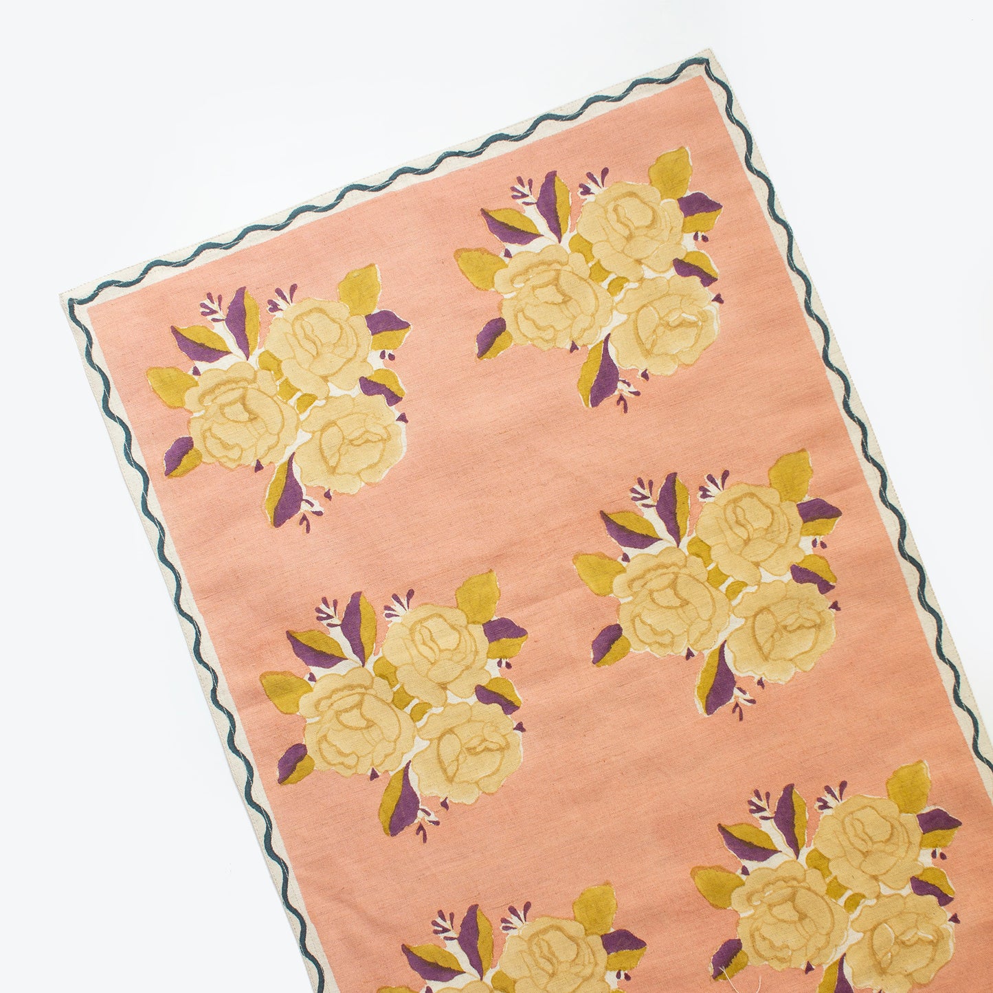 Sara grapefruit block printed linen table runner